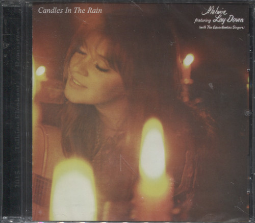 CANDLES IN THE RAIN